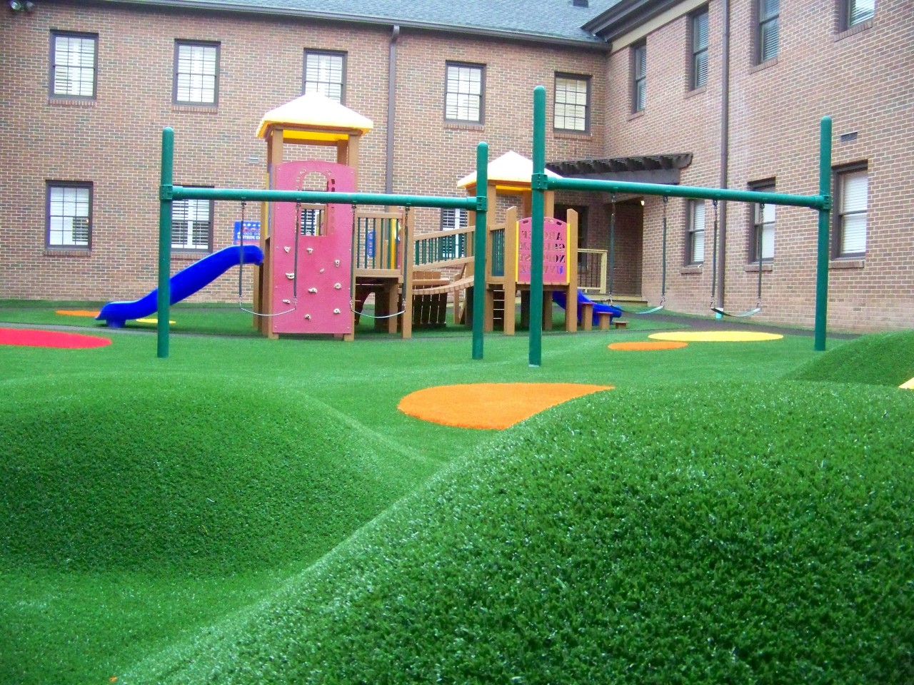 Hilly artificial turf playground by Southwest Greens Pittsburgh